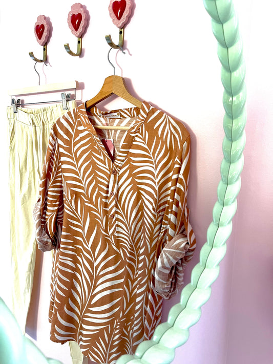 Sand-colored blouse with white foliage 