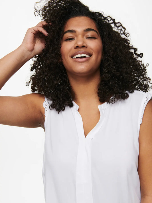 Blouse blanche sans manches